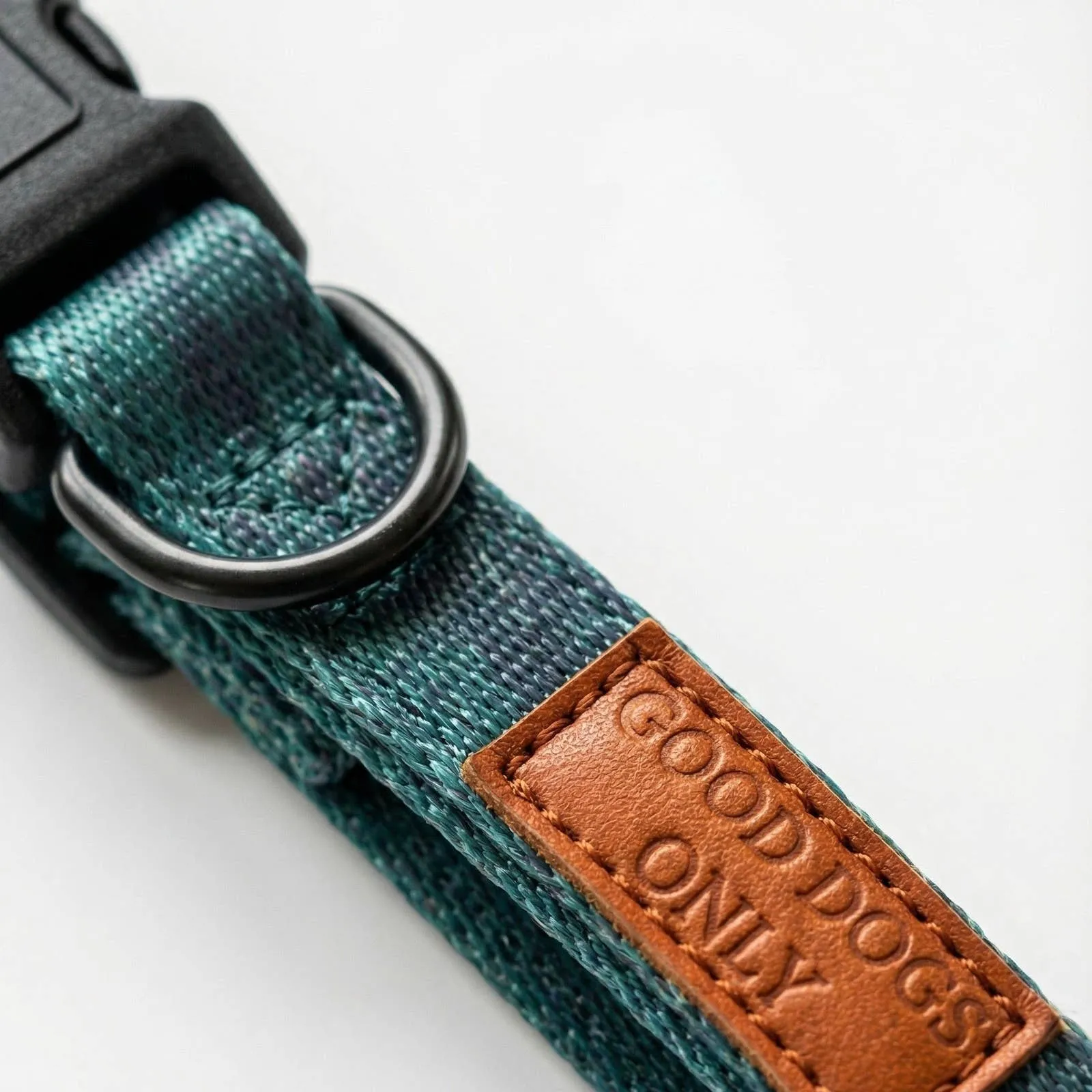 Close-up of the plaid and leather tab